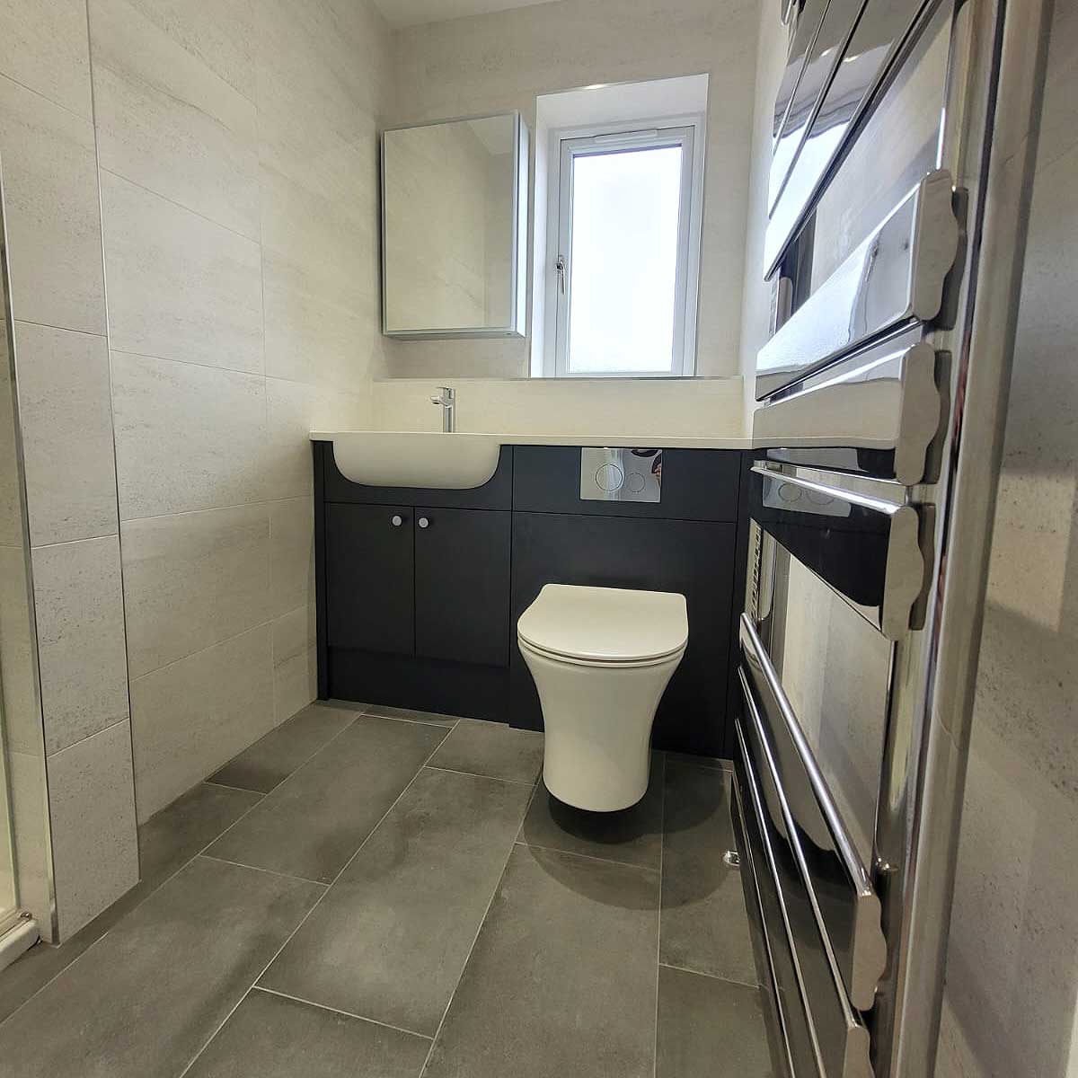 An enlarged and newly refurbished ensuite bathroom in Dorset by Room H2o