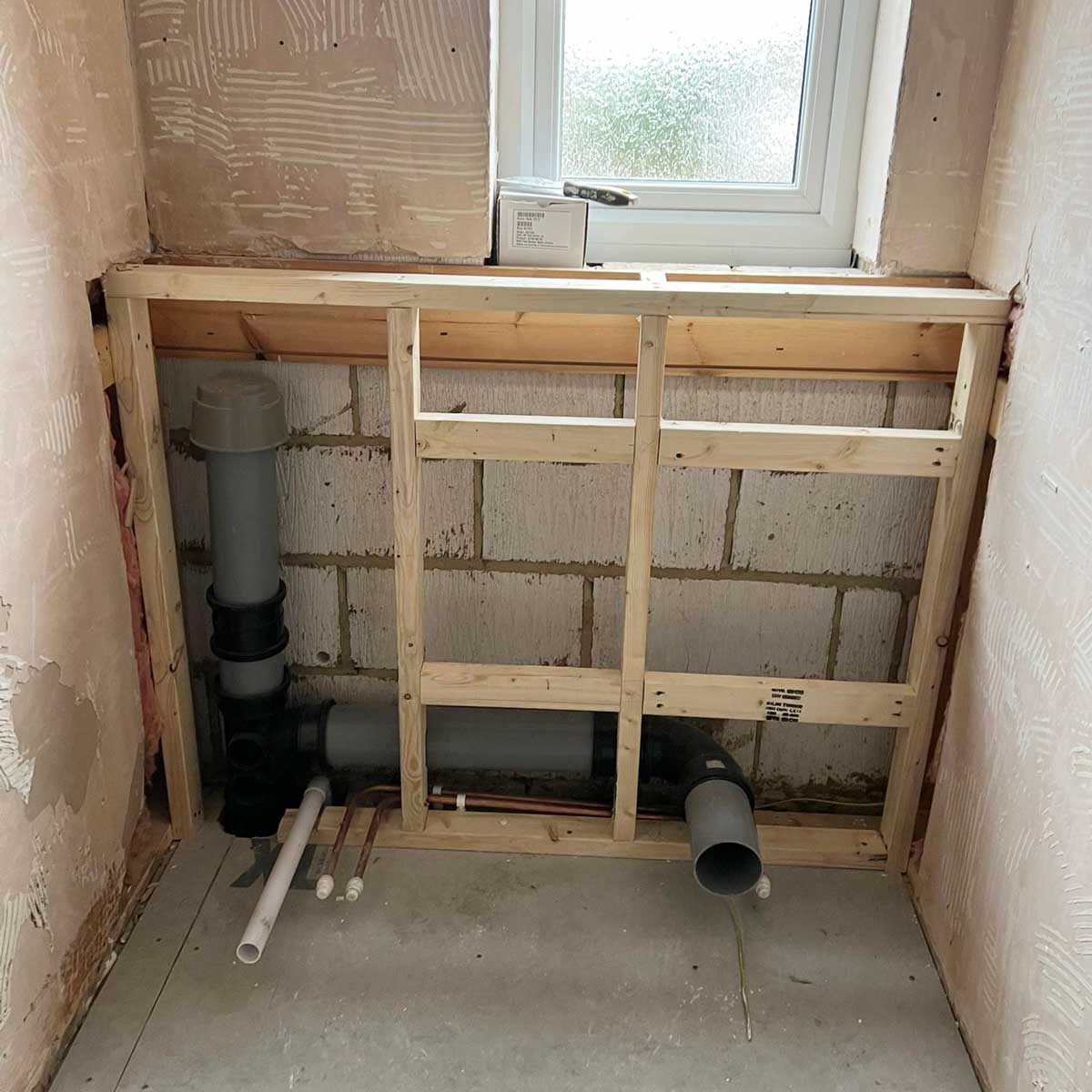 New studwork and plumbing installed by Room H2o as psrt of an ensuite bathroom refurbishment in Dorset