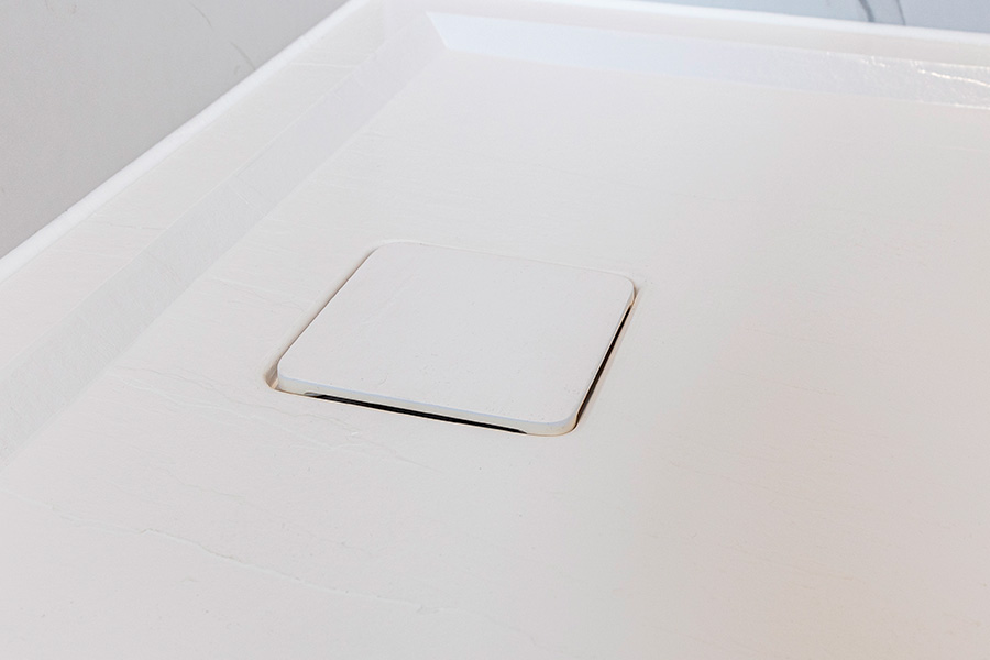 White Matki Preference shower tray with matching concealed waste cover