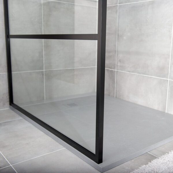 The slim frame detail of a Drench 8mm glass art deco style black shower screen