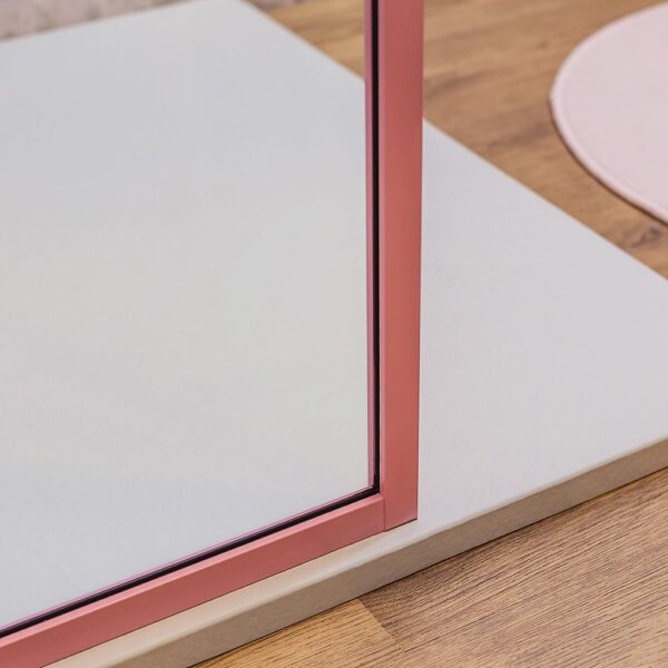 Drench Border minimalist shower screen with matt pink frame detail