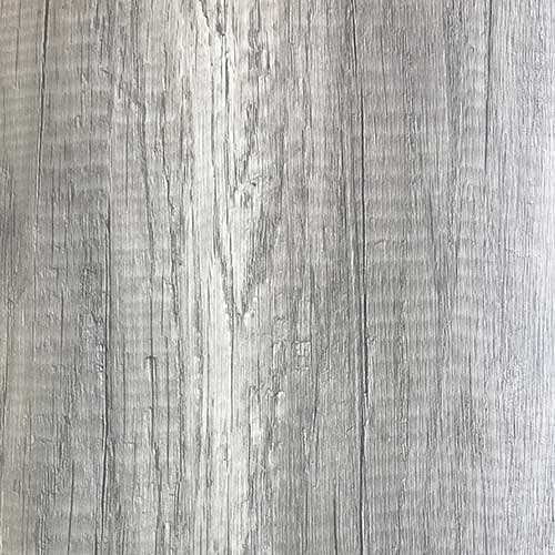 Surface detail image of a Bushboard Nuance Driftwood effect bathroom wall panel in pewter silver colour