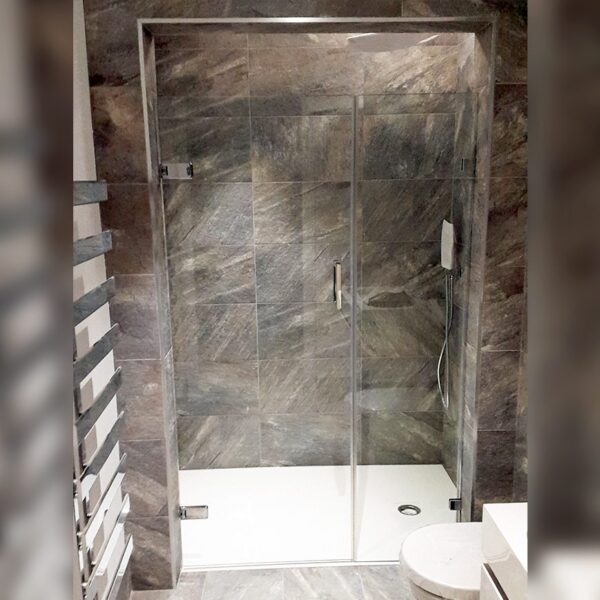 Bespoke framless wall hinged shower door with inline panel