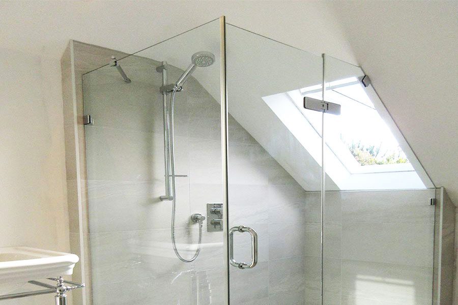 Frameless glass loft shower designed and installed by Room H2o